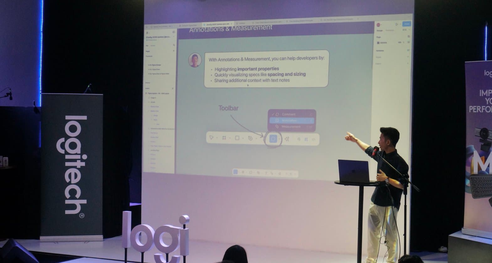 Edward presenting on stage at a Logitech event